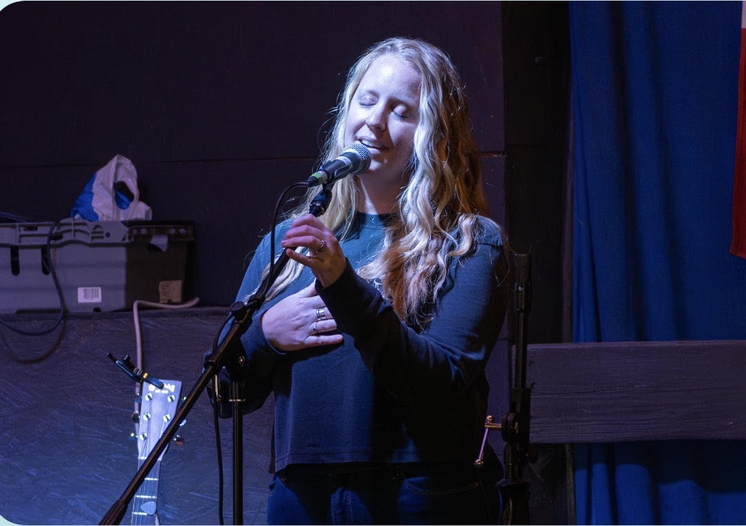 Katie Pascoe of Fresh Breath singing O Canada Photo Credit Per Janke