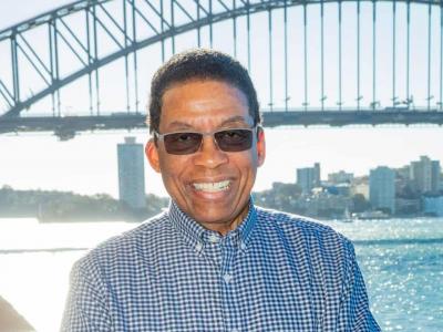 Herbie Hancock poses for a photo in front of the Sydney Harbour Bridge